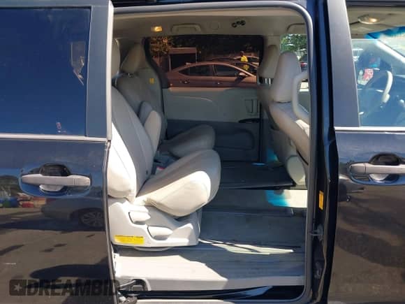 2013 Toyota Sienna L with VIN 5TDZK3DC5DS295686, listed as a IAAI auction lot 43249851 with 126,263 mi miles and . Bid and sale history available at DreamBid. Image 8.