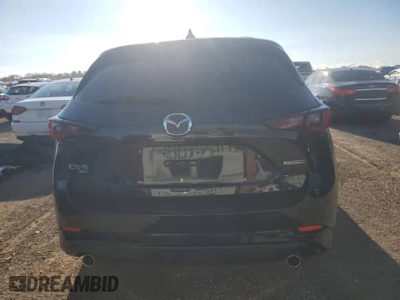 2024 Mazda CX-5 S Carbon Edition z VIN JM3KFBCM5R0357194, wystawiony jako Copart lot #69810105 z przebiegiem 43 722 mil mil oraz Szkoda całkowita • Salvage title. Historia ofert i sprzedaży dostępna na DreamBid. Obrazek 6.