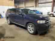 2012 Dodge Durango SXT with VIN 1C4RDJAG2CC267026, listed as a Copart auction lot 71364145 with 129,796 mi miles and Salvage title. Bid and sale history available at DreamBid. Image 4.