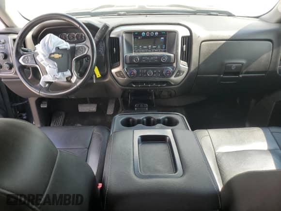 2017 Chevrolet Silverado 1500 LT with VIN 3GCUKREC5HG152835, listed as a Copart auction lot 67742855 with 119,357 mi miles and Salvage title. Bid and sale history available at DreamBid. Image 8.