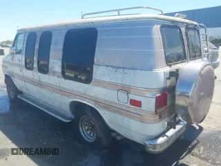 1989 Chevrolet Chevy Van with VIN 1GBEG25K5K7112900, listed as a IAAI auction lot 42931871 with 34,700 mi miles and . Bid and sale history available at DreamBid. Image 3.