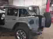 2022 Jeep Wrangler Unlimited Sahara with VIN 1C4HJXENXNW251089, listed as a IAAI auction lot 41728817 with 48,438 mi miles and . Bid and sale history available at DreamBid. Image 6.