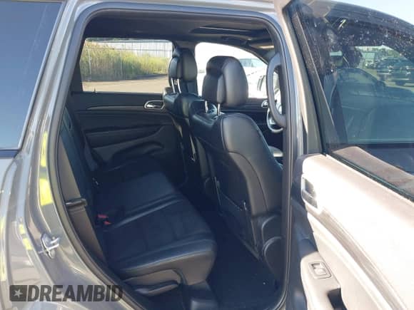2020 Jeep Grand Cherokee Altitude with VIN 1C4RJFAG8LC299047, listed as a IAAI auction lot 42937341 with 27,476 mi miles and . Bid and sale history available at DreamBid. Image 8.