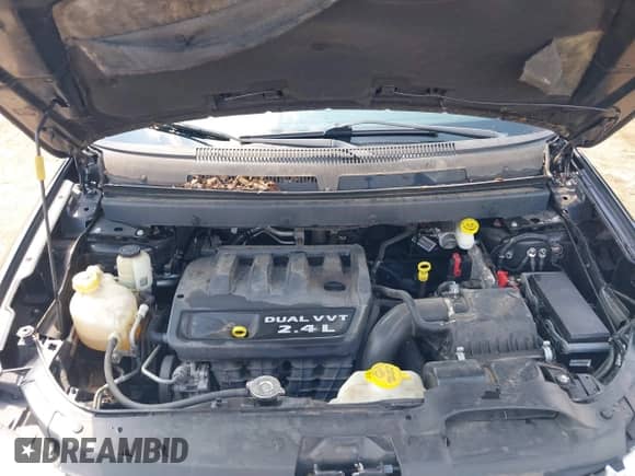 2013 Dodge Journey American Value z VIN 3C4PDCAB1DT665342, wystawiony jako IAAI lot #43204169 z przebiegiem 165 036 mil mil oraz . Historia ofert i sprzedaży dostępna na DreamBid. Obrazek 10.