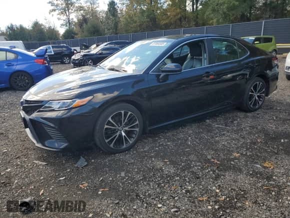 2018 Toyota Camry SE с VIN 4T1B11HK8JU095480, выставлен на аукционе Copart как лот 87464555 с пробегом 223 784 миль миль и Чистый • Clean title. История ставок и продаж доступна на DreamBid. Изображение 1.