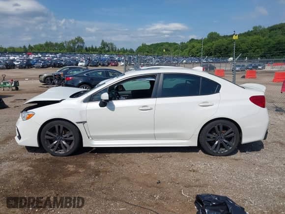 2018 Subaru WRX Premium with VIN JF1VA1C63J9811903, listed as a IAAI auction lot 42719469 with 76,873 mi miles and . Bid and sale history available at DreamBid. Image 14.
