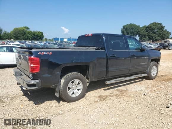 2018 Chevrolet Silverado 1500 LT с VIN 3GCUKREC7JG359703, выставлен на аукционе Copart как лот 69539785 с пробегом 243 935 миль миль и Списание • Salvage title. История ставок и продаж доступна на DreamBid. Изображение 3.