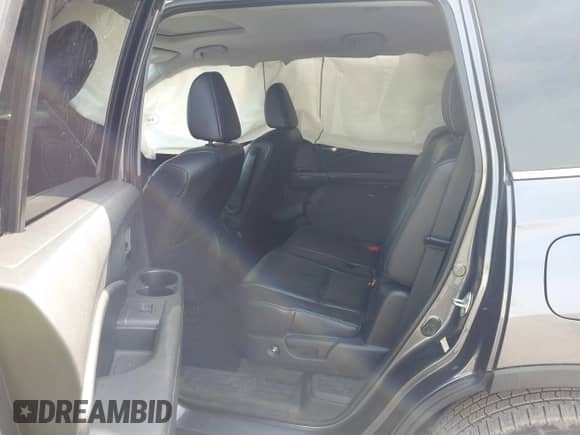 2016 Honda Pilot EX-L with VIN 5FNYF6H57GB015918, listed as a IAAI auction lot 43267717 with 155,812 mi miles and . Bid and sale history available at DreamBid. Image 8.