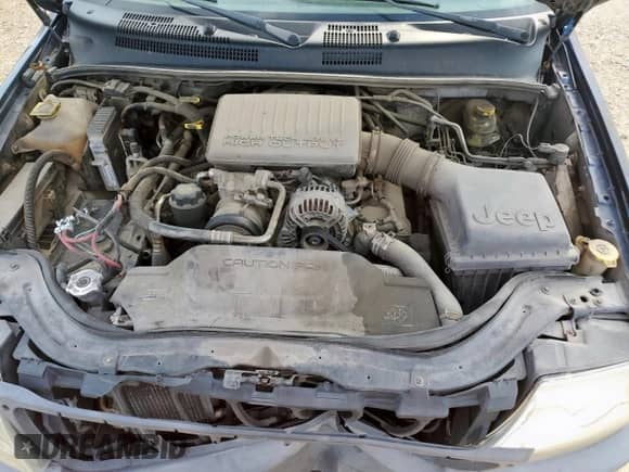 2004 Jeep Grand Cherokee with VIN 1J8GX58J54C121513, listed as a Copart auction lot 59384005 with 221,397 mi miles and Salvage title. Bid and sale history available at DreamBid. Image 12.