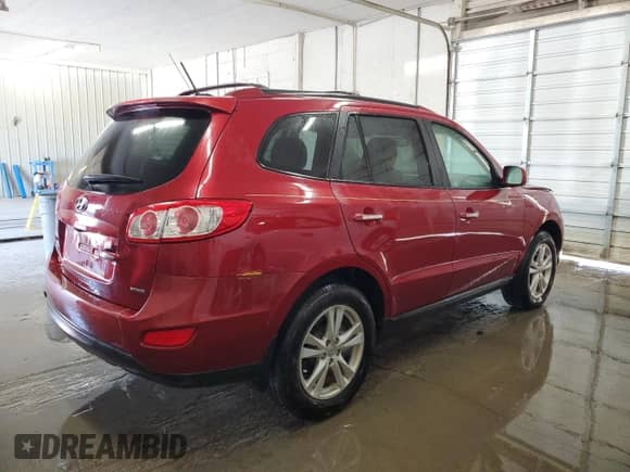 2012 Hyundai Santa Fe Limited с VIN 5XYZK4AG2CG141140, выставлен на аукционе Copart как лот 65231845 с пробегом 134 989 миль миль и Списание • Salvage title. История ставок и продаж доступна на DreamBid. Изображение 3.