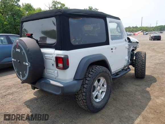 2019 Jeep Wrangler Sport S with VIN 1C4GJXAG0KW552128, listed as a IAAI auction lot 42400023 with 58,131 mi miles and . Bid and sale history available at DreamBid. Image 4.