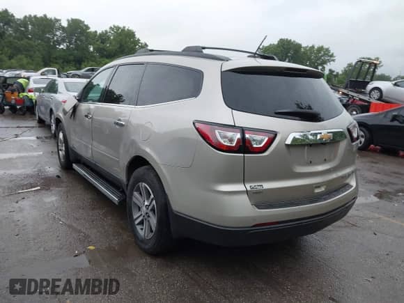 2015 Chevrolet Traverse LT with VIN 1GNKVHKD0FJ262751, listed as a IAAI auction lot 42400430 with 158,815 mi miles and . Bid and sale history available at DreamBid. Image 3.