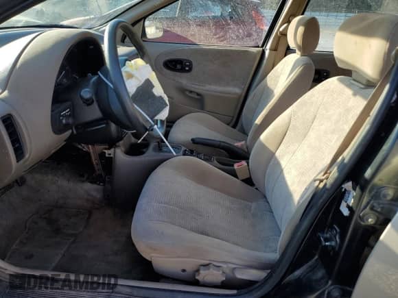 1999 Saturn SW with VIN 1G8ZK8277XZ162136, listed as a Copart auction lot 83206604 with Not provided miles and Salvage title. Bid and sale history available at DreamBid. Image 7.