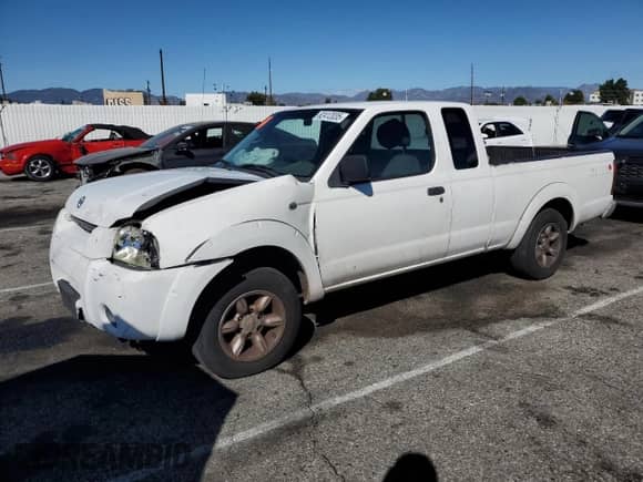 2002 Nissan Frontier XE with VIN 1N6DD26S02C336451, listed as a Copart auction lot 82412035 with 250,739 mi miles and Salvage title. Bid and sale history available at DreamBid. Image 1.