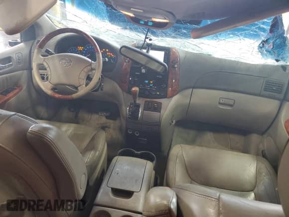 2006 Toyota Sienna XLE z VIN 5TDBA22C06S065249, wystawiony jako Copart lot #67028185 z przebiegiem 254 862 mil mil oraz Nie do naprawy • Non repairable. Historia ofert i sprzedaży dostępna na DreamBid. Obrazek 8.