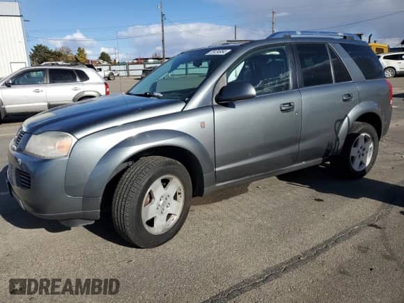 2007 Saturn VUE V6 z VIN 5GZCZ63467S823985, wystawiony jako Copart lot #79124954 z przebiegiem 147 491 mil mil oraz Szkoda całkowita • Salvage title. Historia ofert i sprzedaży dostępna na DreamBid. Obrazek 1.