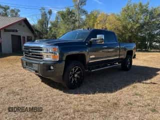 2018 Chevrolet Silverado 2500HD High Country с VIN 1GC1KXEY8JF125042, выставлен на аукционе Copart как лот 90888595 с пробегом 121 356 миль миль и Списание • Salvage title. История ставок и продаж доступна на DreamBid. Изображение 2.