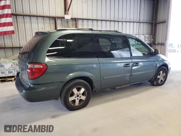 2006 Dodge Grand Caravan SXT z VIN 2D4GP44L16R792201, wystawiony jako Copart lot #72609894 z przebiegiem 236 683 mil mil oraz Czysty tytuł • Clean title. Historia ofert i sprzedaży dostępna na DreamBid. Obrazek 3.