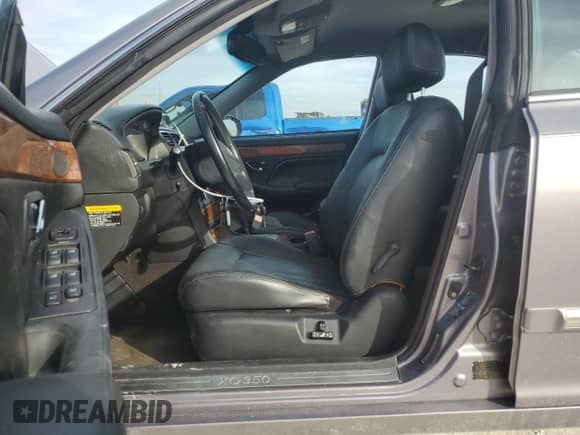 2005 Hyundai XG with VIN KMHFU45E65A411779, listed as a Copart auction lot 87405944 with 39,510 mi miles and Salvage title. Bid and sale history available at DreamBid. Image 7.