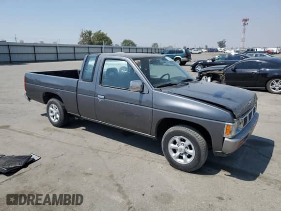 1993 Nissan Frontier with VIN 1N6SD16S1PC439886, listed as a Copart auction lot 71461255 with 205,971 mi miles and Salvage title. Bid and sale history available at DreamBid. Image 4.