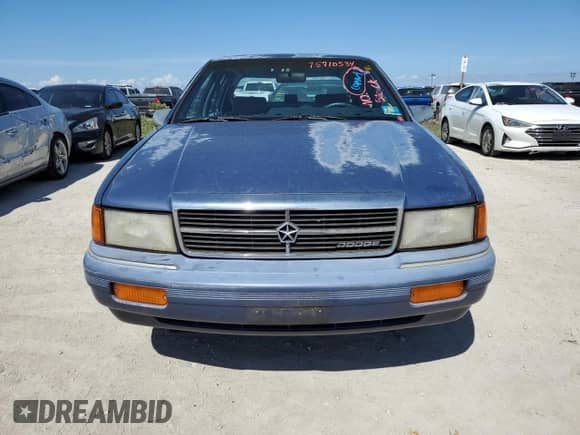 1993 Dodge Spirit with VIN 1B3XA46K0PF638477, listed as a Copart auction lot 75710534 with 50,637 mi miles and Salvage title. Bid and sale history available at DreamBid. Image 5.