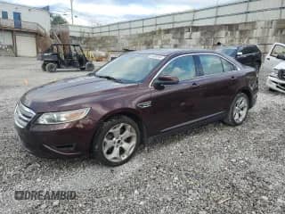 2010 Ford Taurus SEL with VIN 1FAHP2EW0AG111525, listed as a Copart auction lot 81854945 with 128,280 mi miles and Salvage title. Bid and sale history available at DreamBid. Image 1.