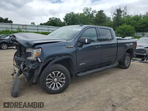 2019 GMC Sierra 1500 AT4 with VIN 1GTP9EED6KZ365682, listed as a Copart auction lot 61931675 with 107,144 mi miles and Salvage title. Bid and sale history available at DreamBid. Image 1.
