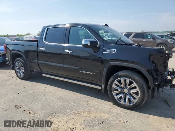 2023 GMC Sierra 1500 Denali z VIN 3GTUUGED8PG262364, wystawiony jako Copart lot #60471545 z przebiegiem 28 443 mil mil oraz Szkoda całkowita • Salvage title. Historia ofert i sprzedaży dostępna na DreamBid. Obrazek 4.