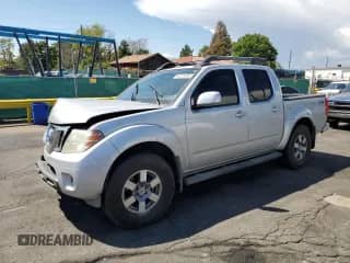2011 Nissan Frontier Pro-4X with VIN 1N6AD0EV6BC421622, listed as a Copart auction lot 69275055 with 186,855 mi miles and Salvage title. Bid and sale history available at DreamBid. Image 1.