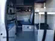 2014 Ford Econoline Cargo Commercial с VIN 1FDSS3EL2EDA82719, выставлен на аукционе Copart как лот 85556275 с пробегом 355 238 миль миль и Списание • Salvage title. История ставок и продаж доступна на DreamBid. Изображение 11.