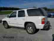2003 Chevrolet Tahoe LT with VIN 1GNEC13Z63R105243, listed as a Copart auction lot 71419035 with 328,362 mi miles and Salvage title. Bid and sale history available at DreamBid. Image 2.