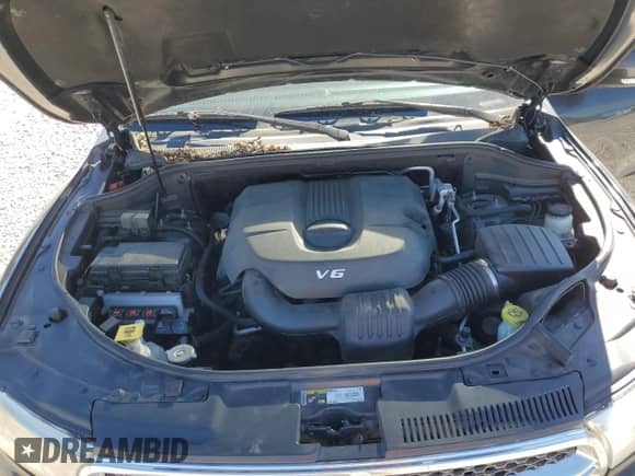 2013 Dodge Durango Crew with VIN 1C4RDJDG6DC695419, listed as a Copart auction lot 87022395 with 219,976 mi miles and Salvage title. Bid and sale history available at DreamBid. Image 12.
