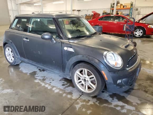 2012 MINI Hardtop S with VIN WMWSV3C51CTY16623, listed as a Copart auction lot 67827615 with 83,852 mi miles and Salvage title. Bid and sale history available at DreamBid. Image 4.