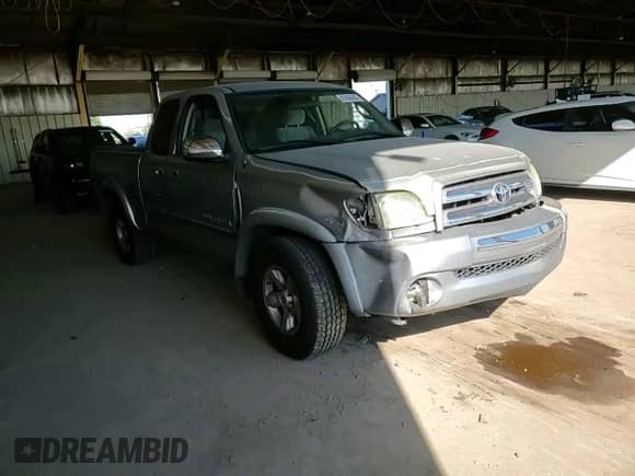 2005 Toyota Tundra SR5 z VIN 5TBRT34105S456421, wystawiony jako Copart lot #81968065 z przebiegiem 199 229 mil mil oraz Szkoda całkowita • Salvage title. Historia ofert i sprzedaży dostępna na DreamBid. Obrazek 13.