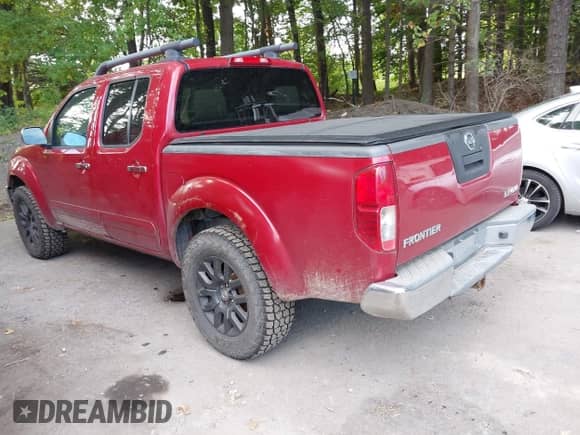 2010 Nissan Frontier LE z VIN 1N6AD0EV1AC443123, wystawiony jako IAAI lot #43161652 z przebiegiem 196 692 mil mil oraz . Historia ofert i sprzedaży dostępna na DreamBid. Obrazek 3.