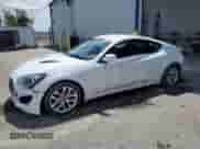 2014 Hyundai Genesis Coupe 2.0T with VIN KMHHT6KD9EU119447, listed as a Copart auction lot 70738185 with 69,494 mi miles and Salvage title. Bid and sale history available at DreamBid. Image 1.