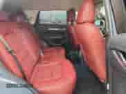 2023 Mazda CX-5 S Carbon Edition z VIN JM3KFBCM3P0135072, wystawiony jako Copart lot #81649475 z przebiegiem 21 569 mil mil oraz Szkoda całkowita • Salvage title. Historia ofert i sprzedaży dostępna na DreamBid. Obrazek 10.