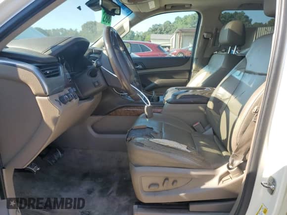2015 Chevrolet Tahoe LTZ с VIN 1GNSKCKC5FR194824, выставлен на аукционе Copart как лот 71463875 с пробегом 169 679 миль миль и Списание • Salvage title. История ставок и продаж доступна на DreamBid. Изображение 7.