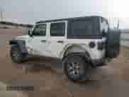 2021 Jeep Wrangler Unlimited Rubicon with VIN 1C4HJXFN8MW723304, listed as a Copart auction lot 68674255 with 69,170 mi miles and Salvage title. Bid and sale history available at DreamBid. Image 2.