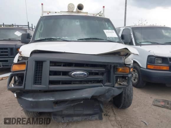 2009 Ford Econoline Cargo Commercial with VIN 1FTSS34L19DA40330, listed as a IAAI auction lot 42848490 with 438,548 mi miles and . Bid and sale history available at DreamBid. Image 12.