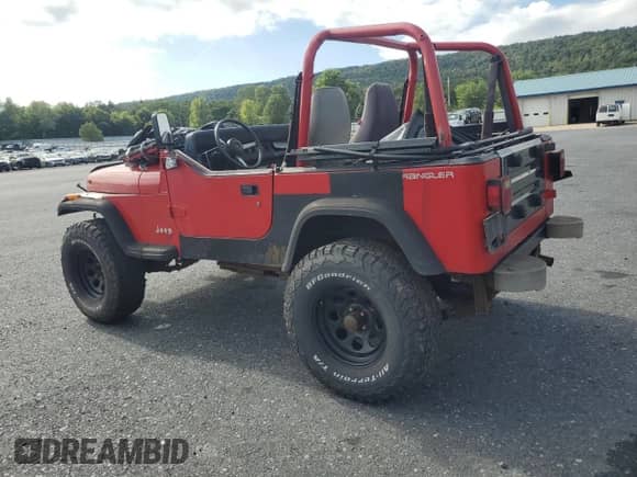 1995 Jeep Wrangler S with VIN 1J4FY19P3SP285709, listed as a Copart auction lot 69659545 with 200,636 mi miles and Salvage title. Bid and sale history available at DreamBid. Image 2.