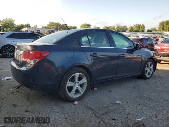 2014 Chevrolet Cruze 2LT с VIN 1G1PE5SB3E7235057, выставлен на аукционе Copart как лот 69652905 с пробегом 91 452 миль миль и Списание • Salvage title. История ставок и продаж доступна на DreamBid. Изображение 3.