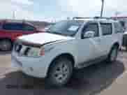 2009 Nissan Pathfinder LE z VIN 5N1AR18B19C609840, wystawiony jako IAAI lot #42109147 z przebiegiem 188 844 mil mil oraz . Historia ofert i sprzedaży dostępna na DreamBid. Obrazek 17.