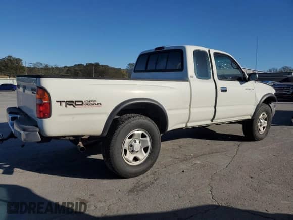 1998 Toyota Tacoma with VIN 4TASM92N1WZ175674, listed as a Copart auction lot 89734125 with 214,966 mi miles and Salvage title. Bid and sale history available at DreamBid. Image 3.