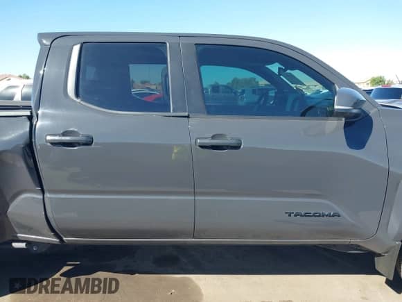 2024 Toyota Tacoma SR5 with VIN 3TMLB5FN8RM005075, listed as a IAAI auction lot 43290415 with 20,318 mi miles and . Bid and sale history available at DreamBid. Image 13.