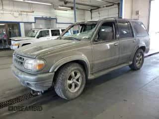 2000 Ford Explorer Limited with VIN 1FMDU75EXYZA41631, listed as a Copart auction lot 63808935 with 221,084 mi miles and Salvage title. Bid and sale history available at DreamBid. Image 1.