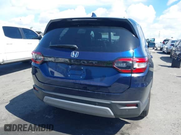 2024 Honda Pilot EX-L with VIN 5FNYG2H57RB004488, listed as a IAAI auction lot 41796097 with 18,479 mi miles and . Bid and sale history available at DreamBid. Image 17.