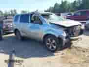 2014 Honda Pilot EX-L with VIN 5FNYF4H52EB025080, listed as a IAAI auction lot 43124399 with 183,634 mi miles and . Bid and sale history available at DreamBid. Image 1.