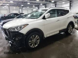 2018 Hyundai Santa Fe 2.0T с VIN 5XYZUDLA5JG512405, выставлен на аукционе Copart как лот 80729765 с пробегом 119 825 миль миль и Списание • Salvage title. История ставок и продаж доступна на DreamBid. Изображение 1.