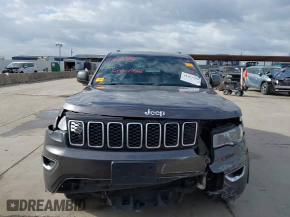 2018 Jeep Grand Cherokee Laredo z VIN 1C4RJEAG7JC450922, wystawiony jako IAAI lot #41169294 z przebiegiem 158 689 mil mil oraz . Historia ofert i sprzedaży dostępna na DreamBid. Obrazek 13.